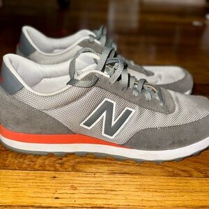 New Balance Gray Sneakers with Orange Highlights